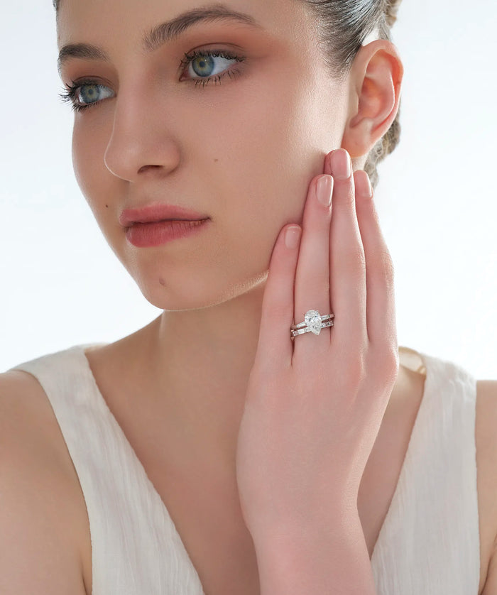 Pear Cut Lab Grown Diamond Bridal Set with Tapered Baguette Band in Gold