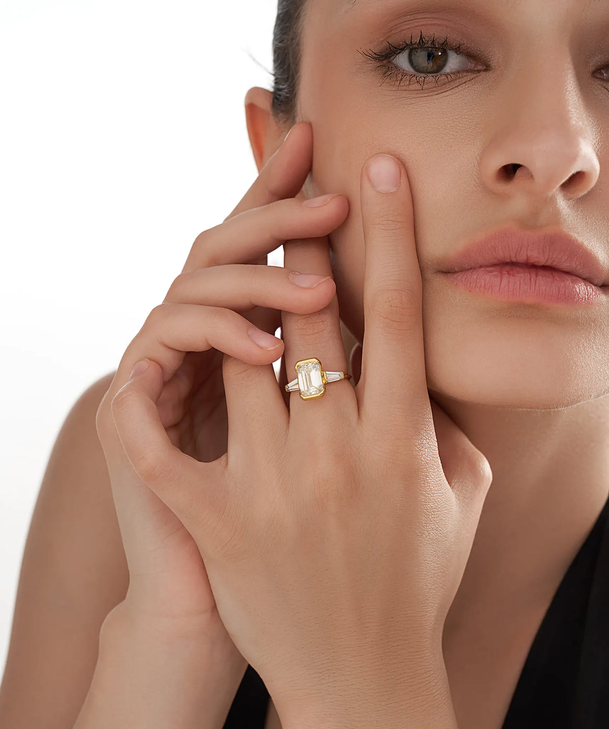 Half Bezel Emerald Cut Lab Grown Diamond Ring with Tapered Baguettes in Gold