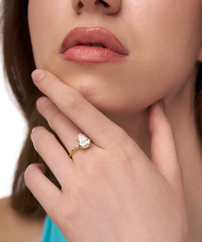 Pear Cut Lab Grown Diamond Bypass Engagement Ring with Marquise Accents in Gold