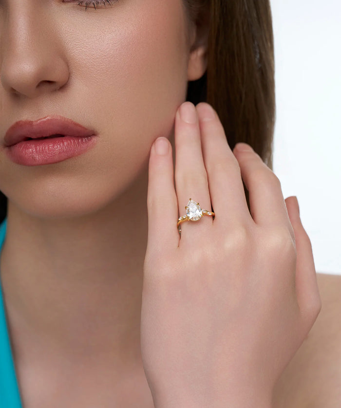 Pear Cut Lab Grown Diamond Bypass Engagement Ring with Marquise Accents in Gold