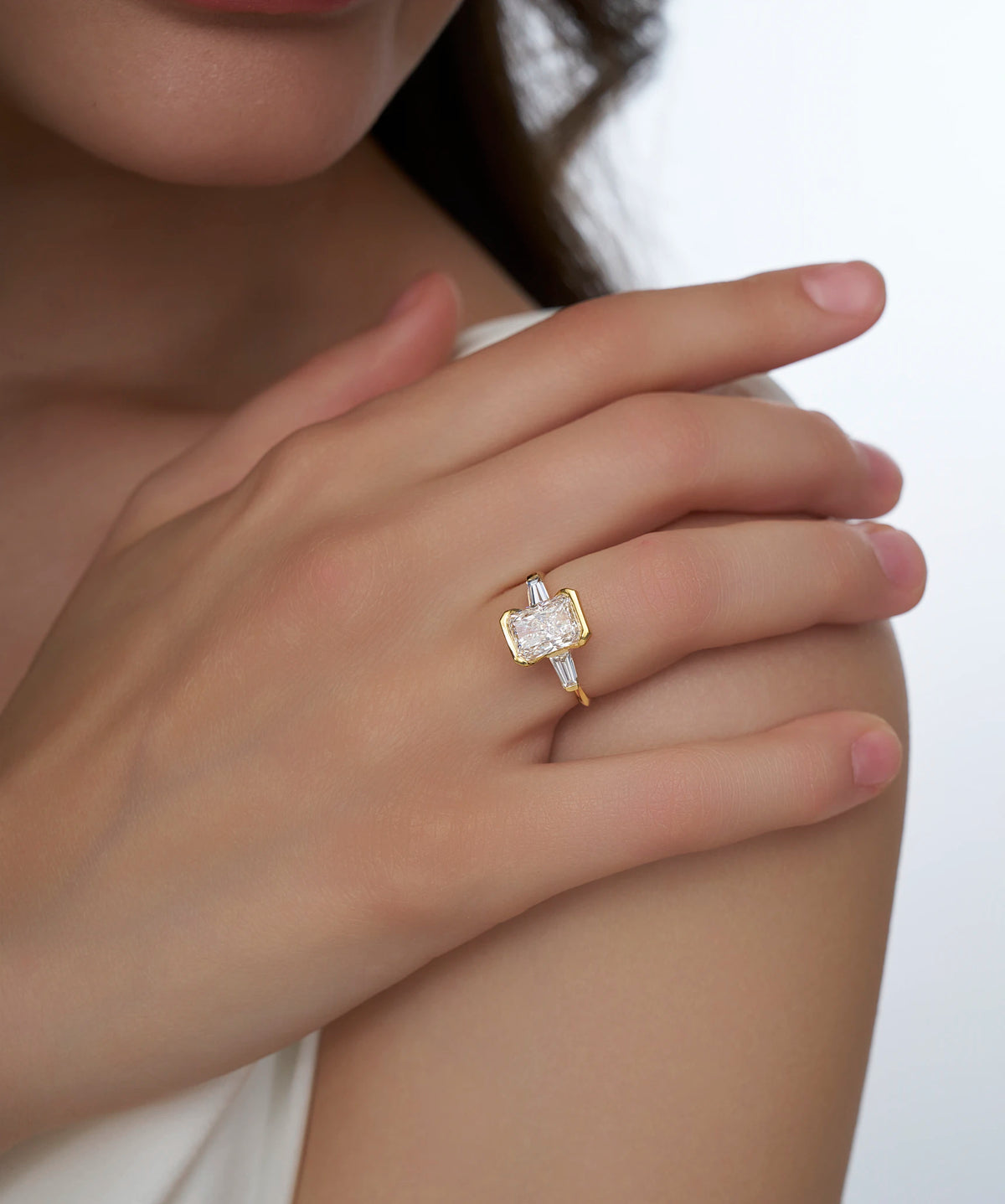 Half Bezel Radiant Cut Lab Grown Diamond Ring with Tapered Baguettes in Gold