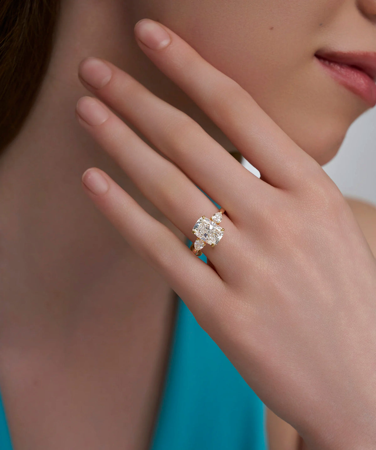 Elongated Cushion Cut Lab Grown Diamond Three Stone Ring with Pear Sides in Gold