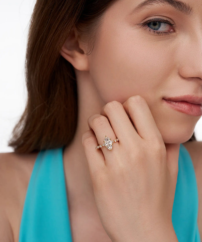 Marquise Cut Lab Grown Diamond Engagement Ring with Pear and Round Accents in Gold