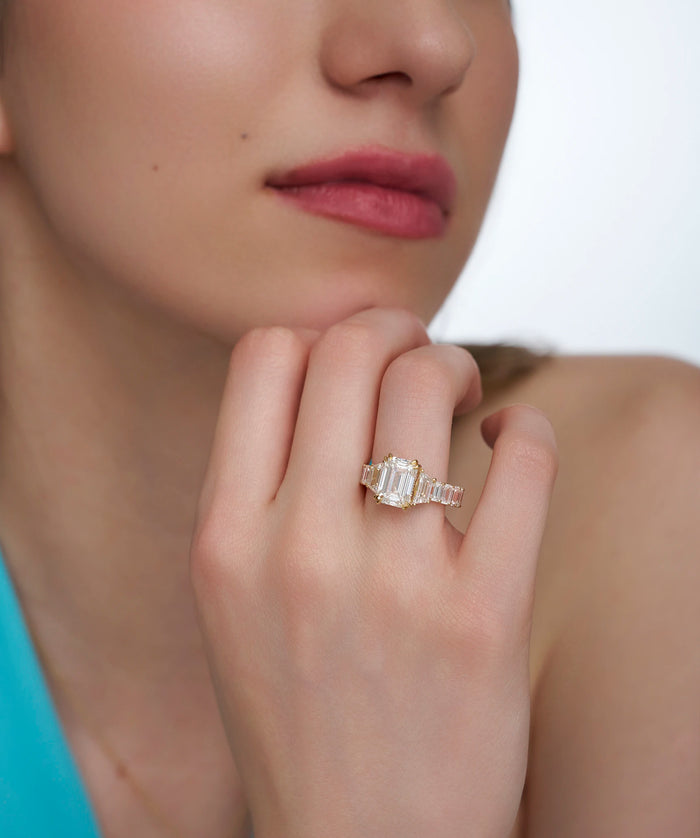 Emerald Cut Three Stone Ring with Trapezoid Sides