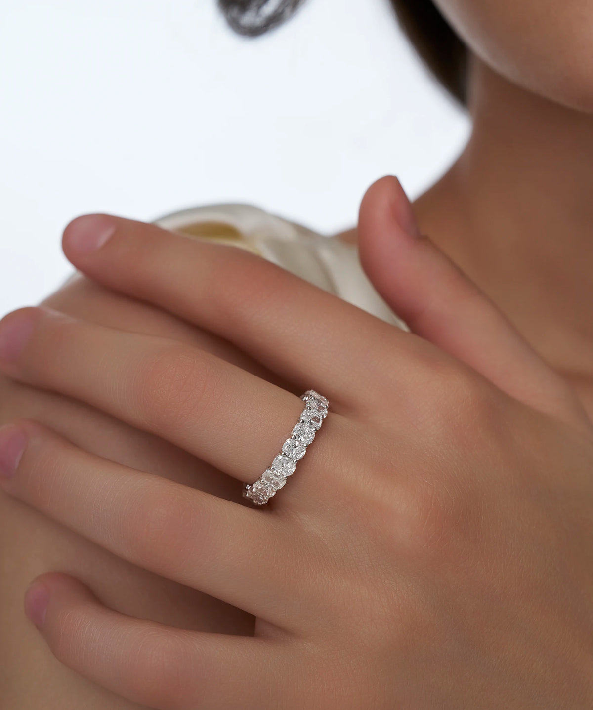 Shared Prong Oval Half Eternity Band