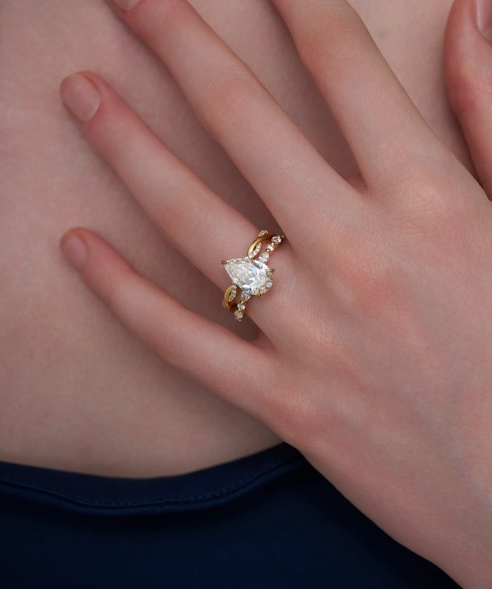 Oval Lab Grown Diamond Hidden Halo Bridal Set with Curved Band in Gold