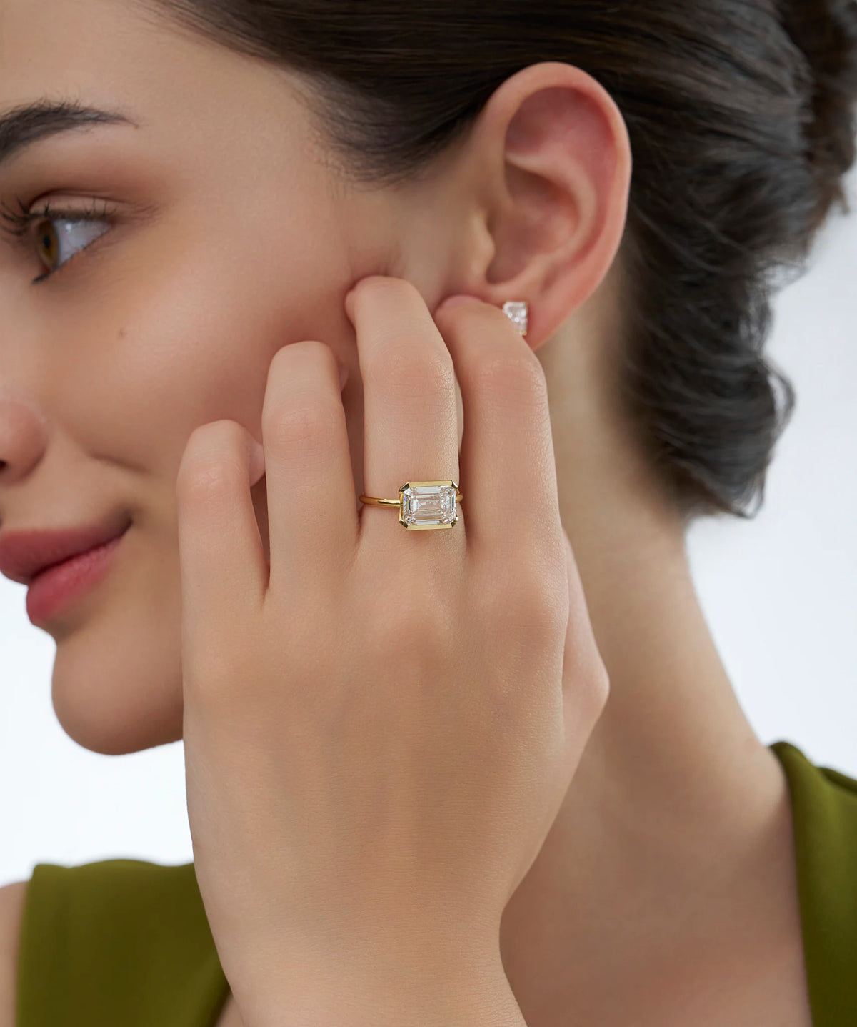 East West Emerald Cut Lab Grown Diamond Half Bezel Solitaire Ring in Gold