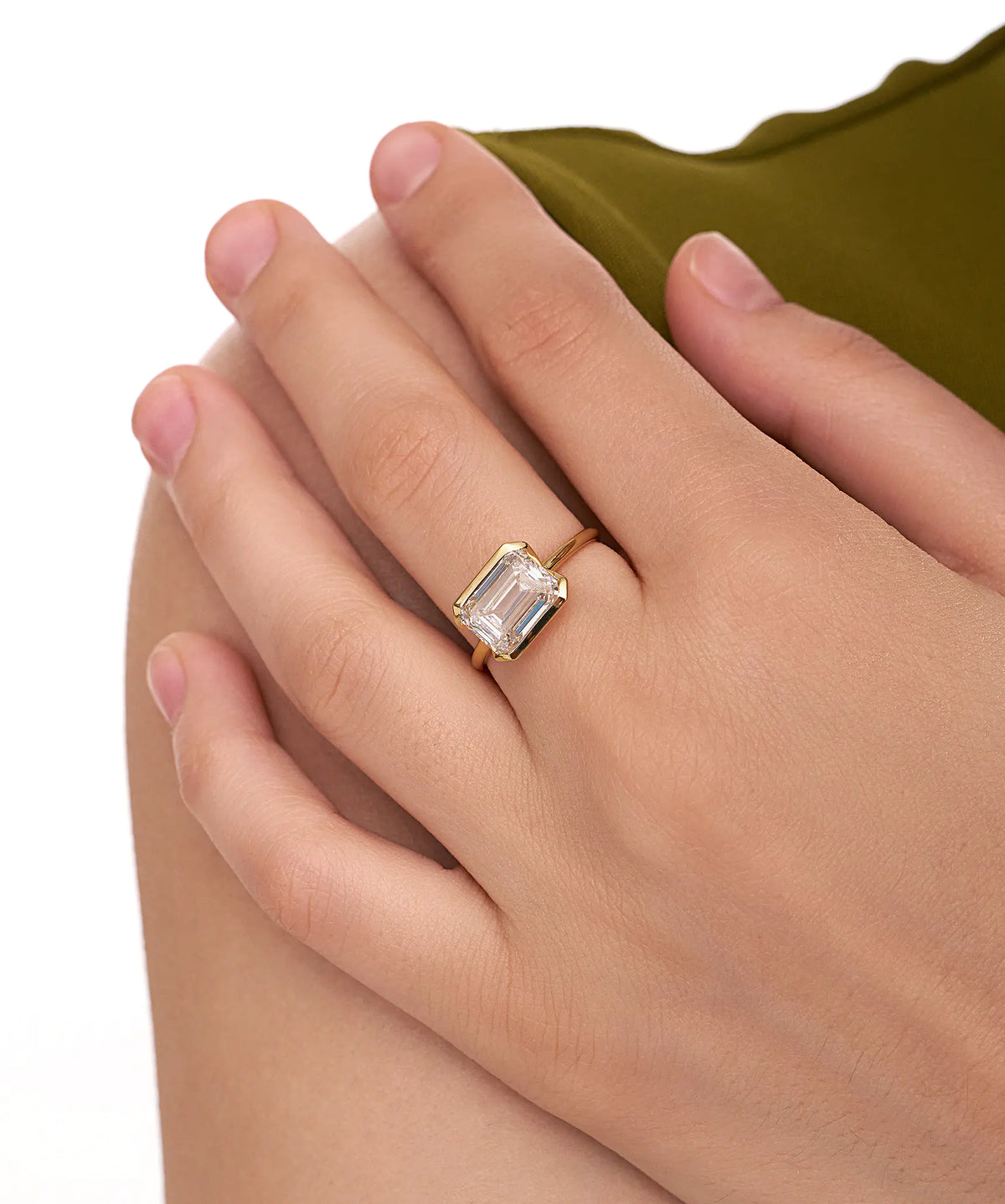 East West Emerald Cut Lab Grown Diamond Half Bezel Solitaire Ring in Gold