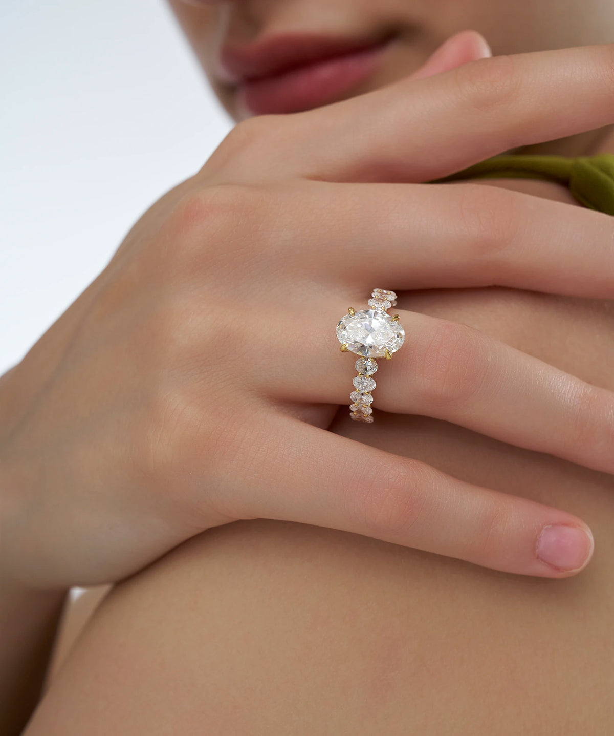 Oval Cut Lab Grown Diamond Engagement Ring with Round Accents in Gold