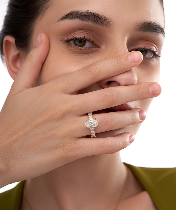 Oval Cut Lab Grown Diamond Engagement Ring with Round Accents in Gold