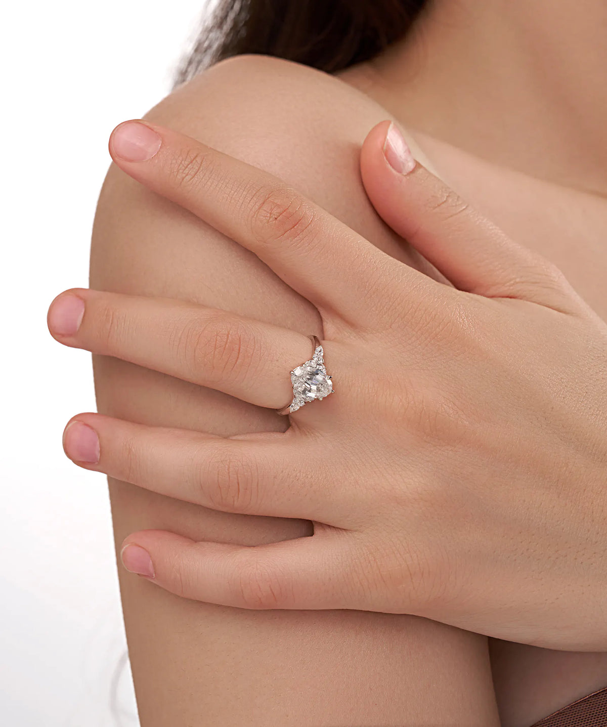 Oval Cut Lab Grown Diamond Cluster Engagement Ring with Marquise and Pear Accents in Gold