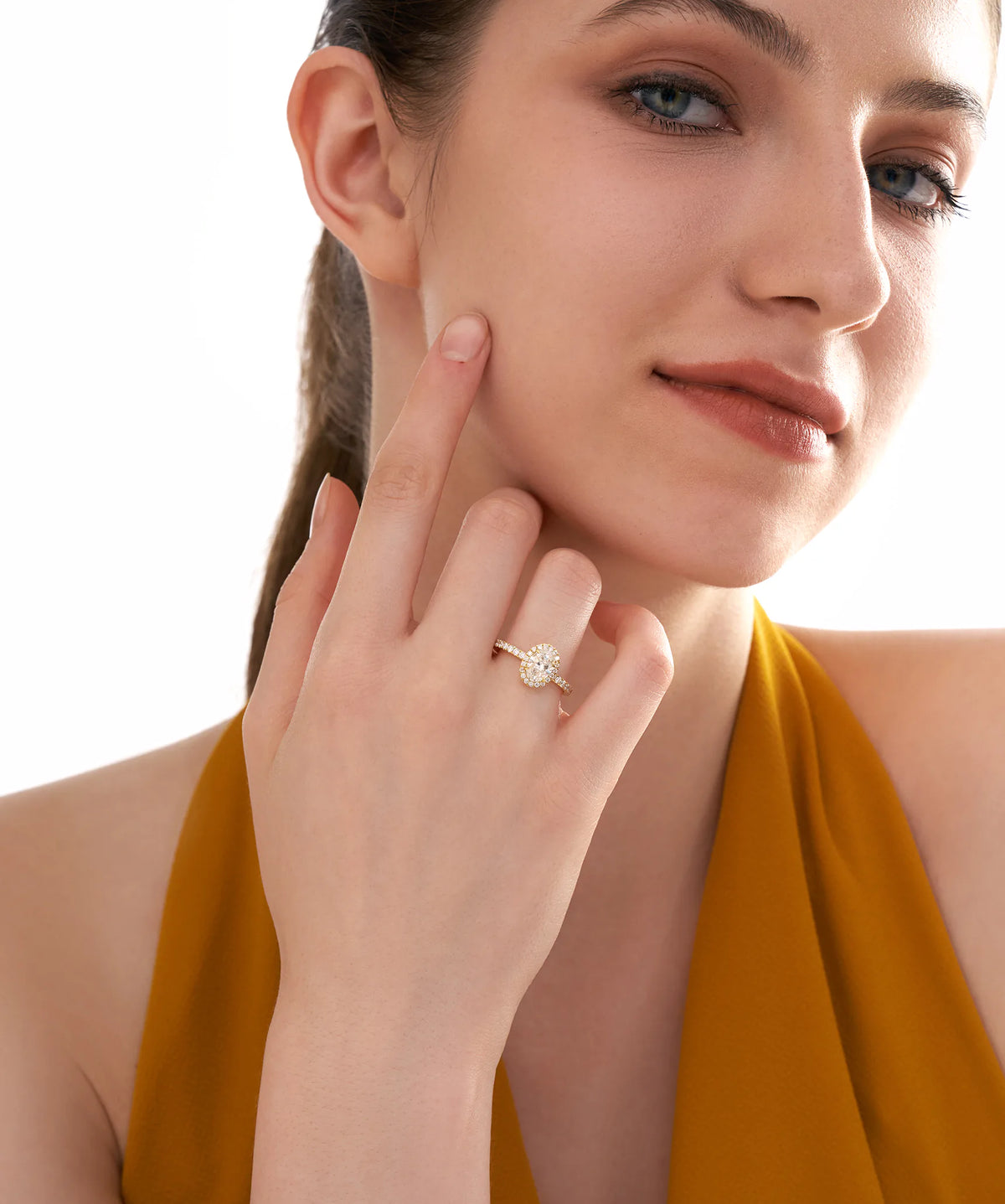Oval Cut Lab Grown Diamond Halo Engagement Ring in Gold