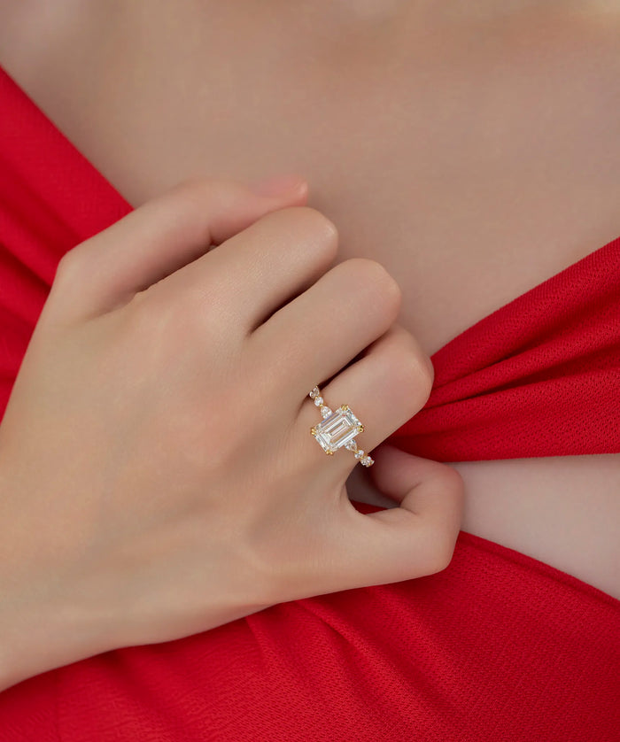 Emerald Cut Lab Grown Diamond Engagement Ring with Pear and Round Accents in Gold