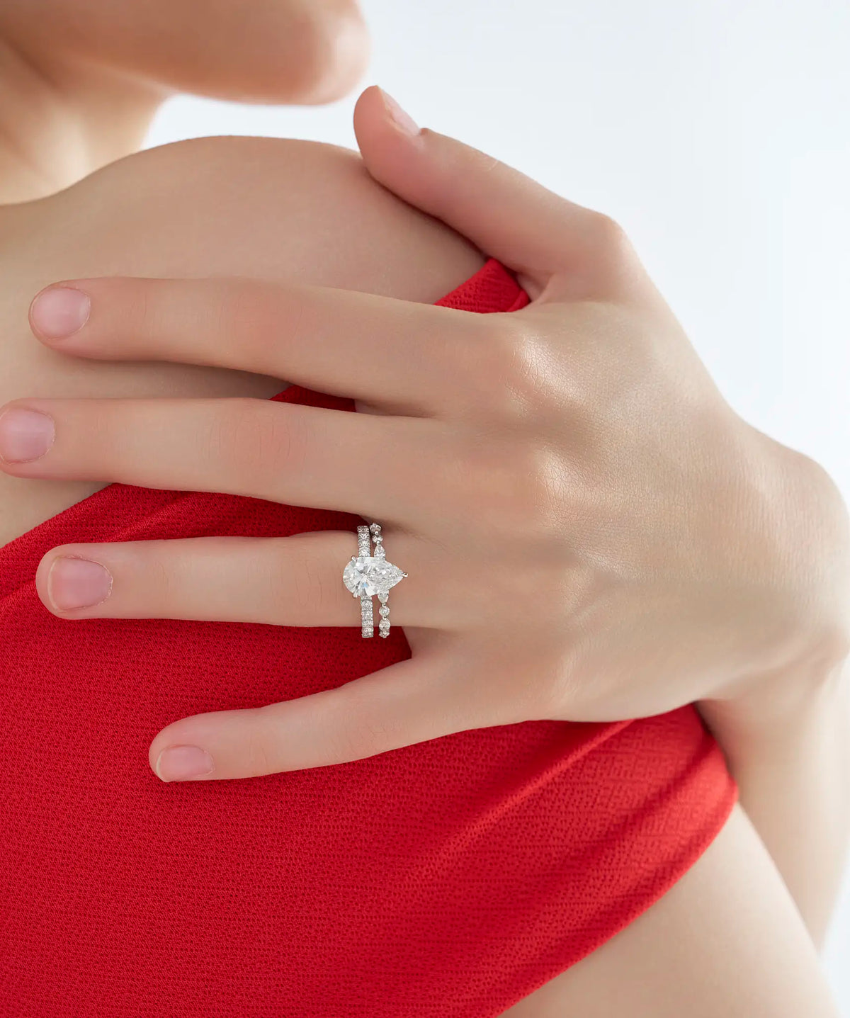 Pear Cut Lab Grown Diamond Hidden Halo Bridal Set with Marquise Band in Gold