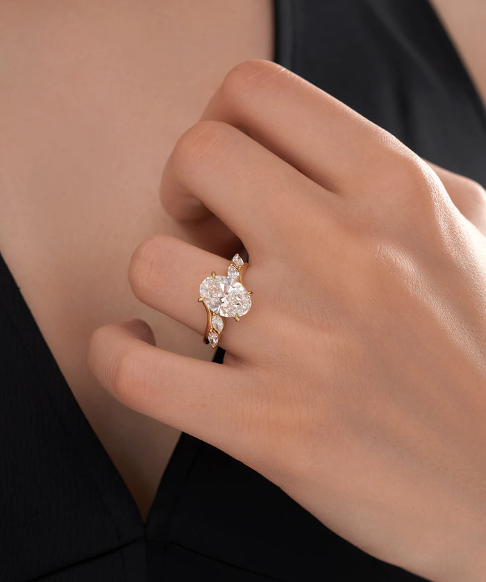 Oval Cut Lab Grown Diamond Vine Engagement Ring with Marquise Leaves in Gold