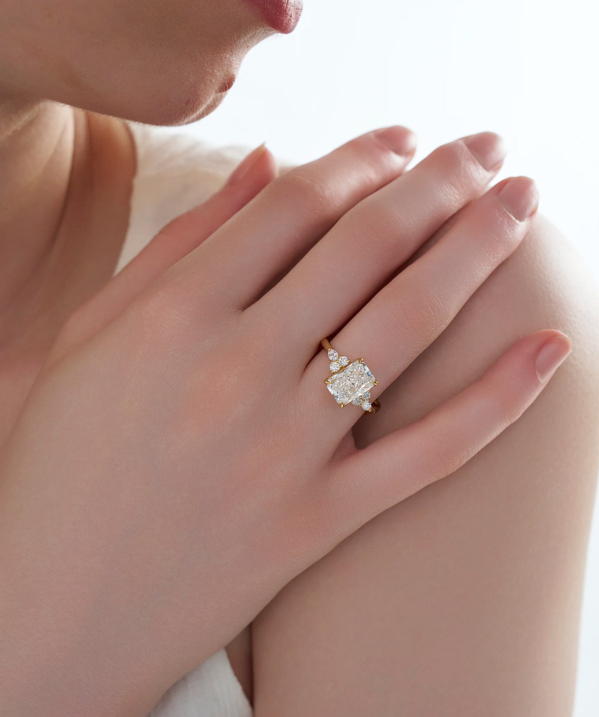 Radiant Cut Lab Grown Diamond Engagement Ring with Pear and Round Accents in Gold