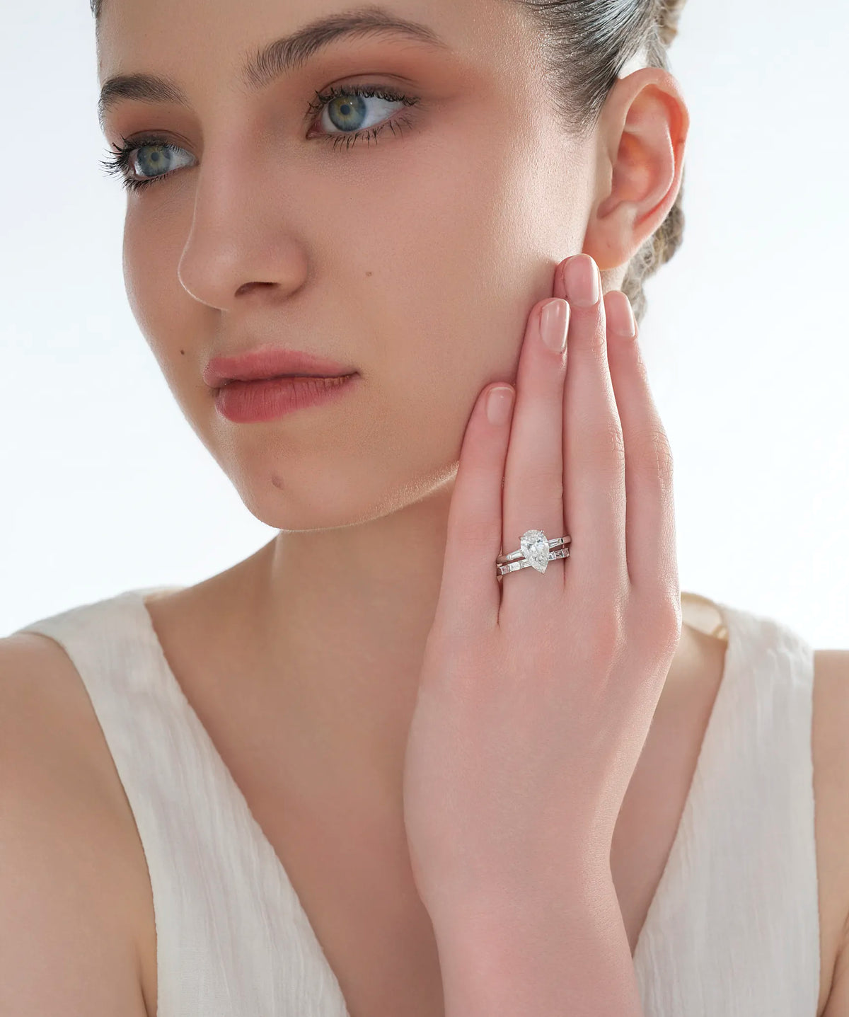 Pear Cut Lab Grown Diamond Bridal Set with Tapered Baguette Band in Gold