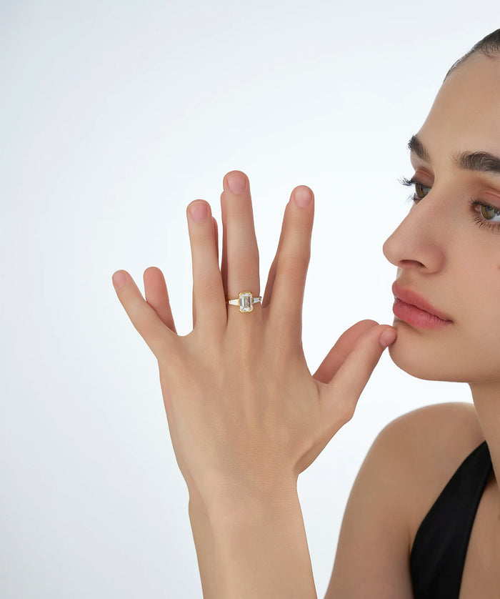 Half Bezel Emerald Cut Lab Grown Diamond Ring with Tapered Baguettes in Gold