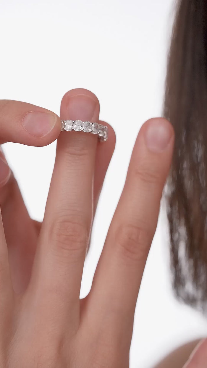 Shared Prong Oval Half Eternity Band