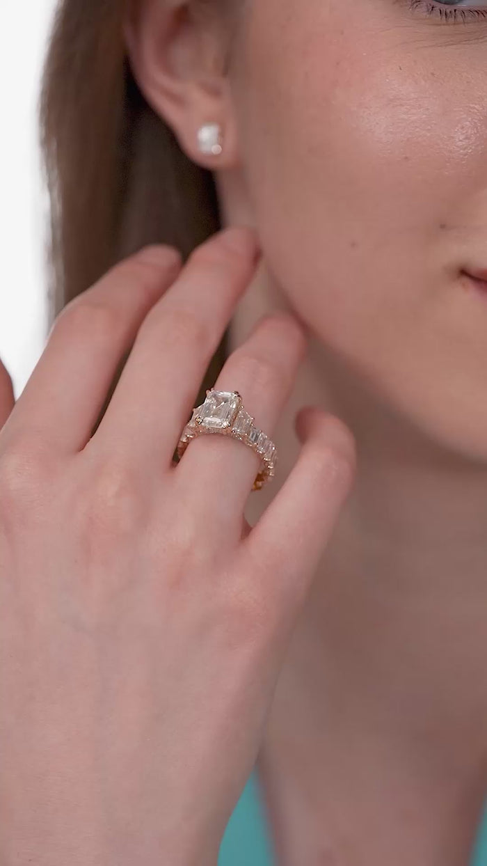 Emerald Cut Solitaire Ring with Tapered Baguette Sides