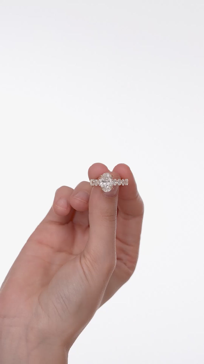 Oval Cut Lab Grown Diamond Engagement Ring with Round Accents in Gold